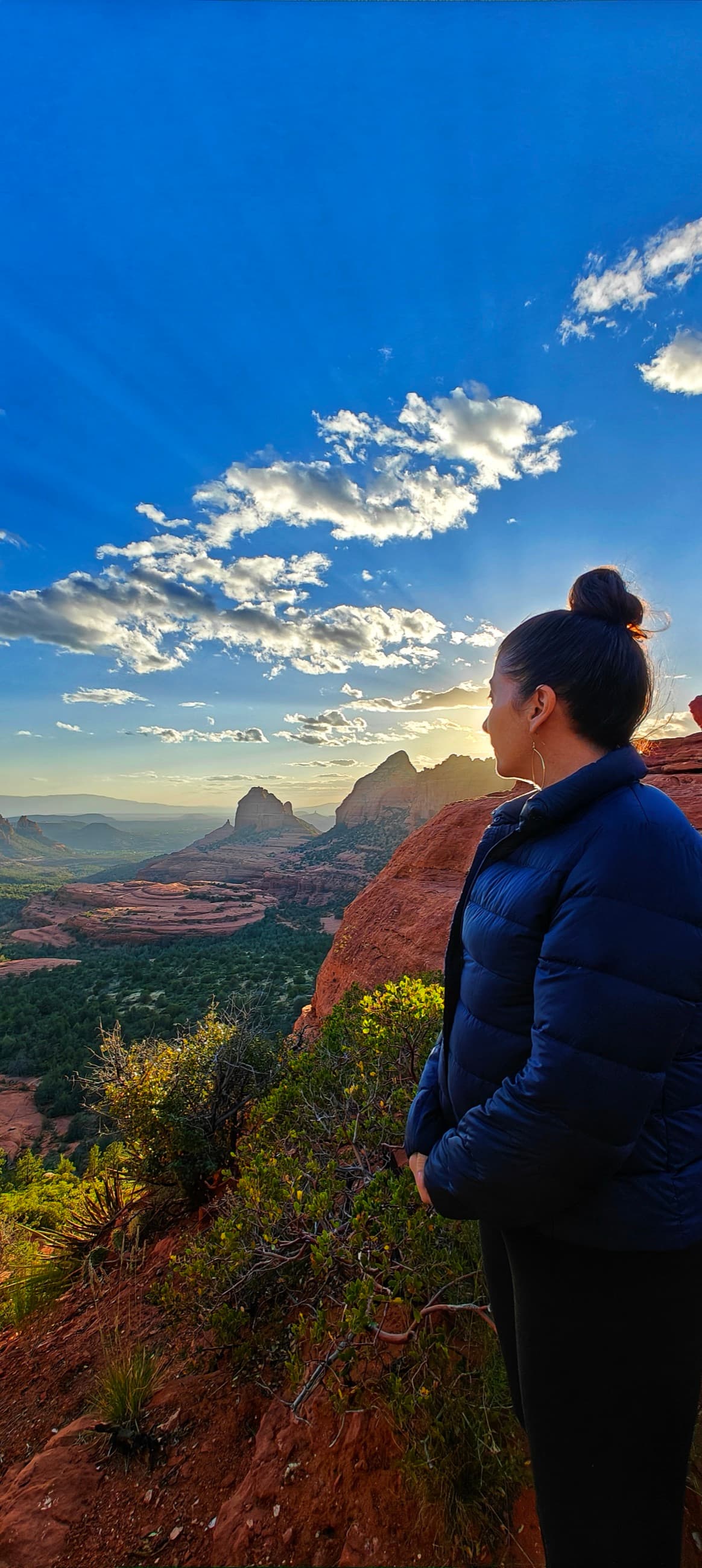 Jennifer overlooking the red rocks of Sedona at sunset